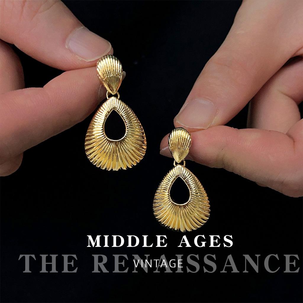 European and American style heavy industry golden water drop hollow earrings French court style stud earrings