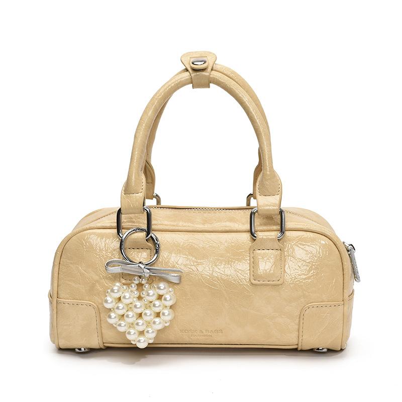 Korean niche simple portable bowling bag women 2025 new versatile foreign style fashion messenger pillow bag