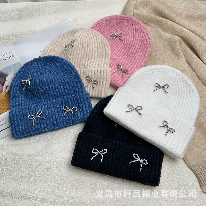 Autumn and winter new Xiaoxiangfeng steel ball bow wool hat versatile women's big head circumference ear protector knitted cold hat