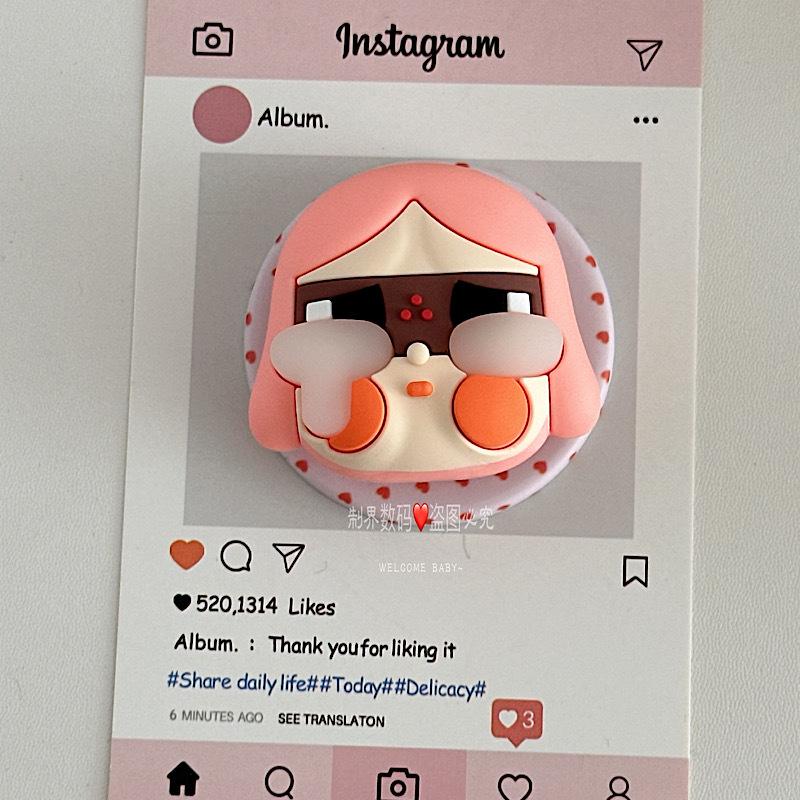 KT Cat Crying Doll Phone Holder – Cute, Fun, Versatile, Airbag Design for Desktop or Drama Watching.