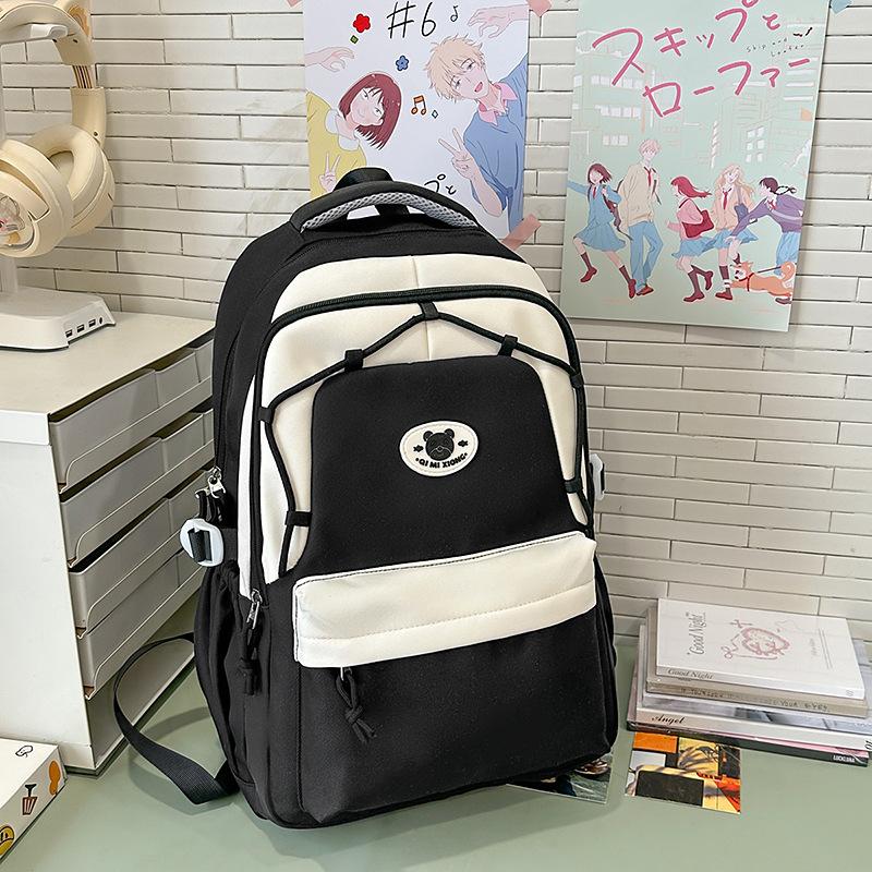 New Decompression Large Capacity Schoolbag Junior High School Girls and Senior High School Students Light Campus Backpack.
