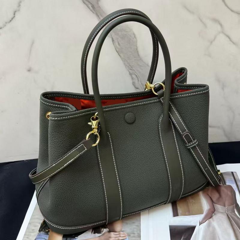 2025 New Style Genuine Leather Womens Bag Top Layer Cowhide 30 Flower Garden Bag Solid Color Cowhide Waxed Canvas Strap Handbag Single Compartment Bag