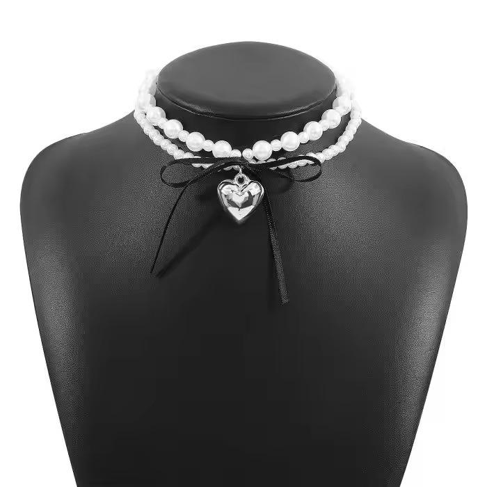 

Korean sweet and cool style ribbon bow love double-layer pearl necklace female niche design sense collarbone chain срібний