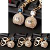 Elegant Rhinestone Perfume Bottle Car Keychain For Women Stylish Handbag Charm
