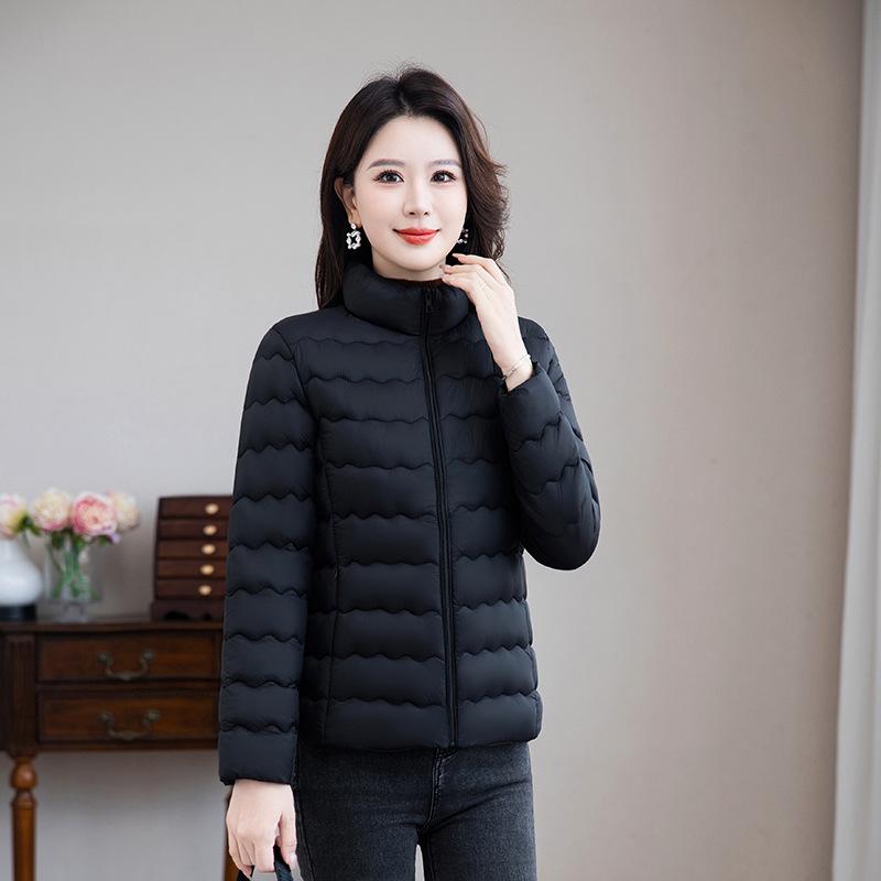 

Жіноча стьобана коротка пухова куртка легка стійка комір 5XL чорний