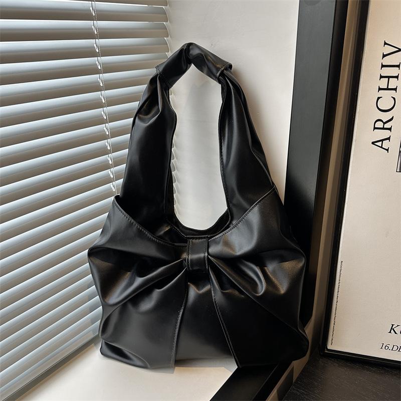 Korean version of casual underarm women's bag 2025 new simple bow design sense tote bag simple portable shoulder bag