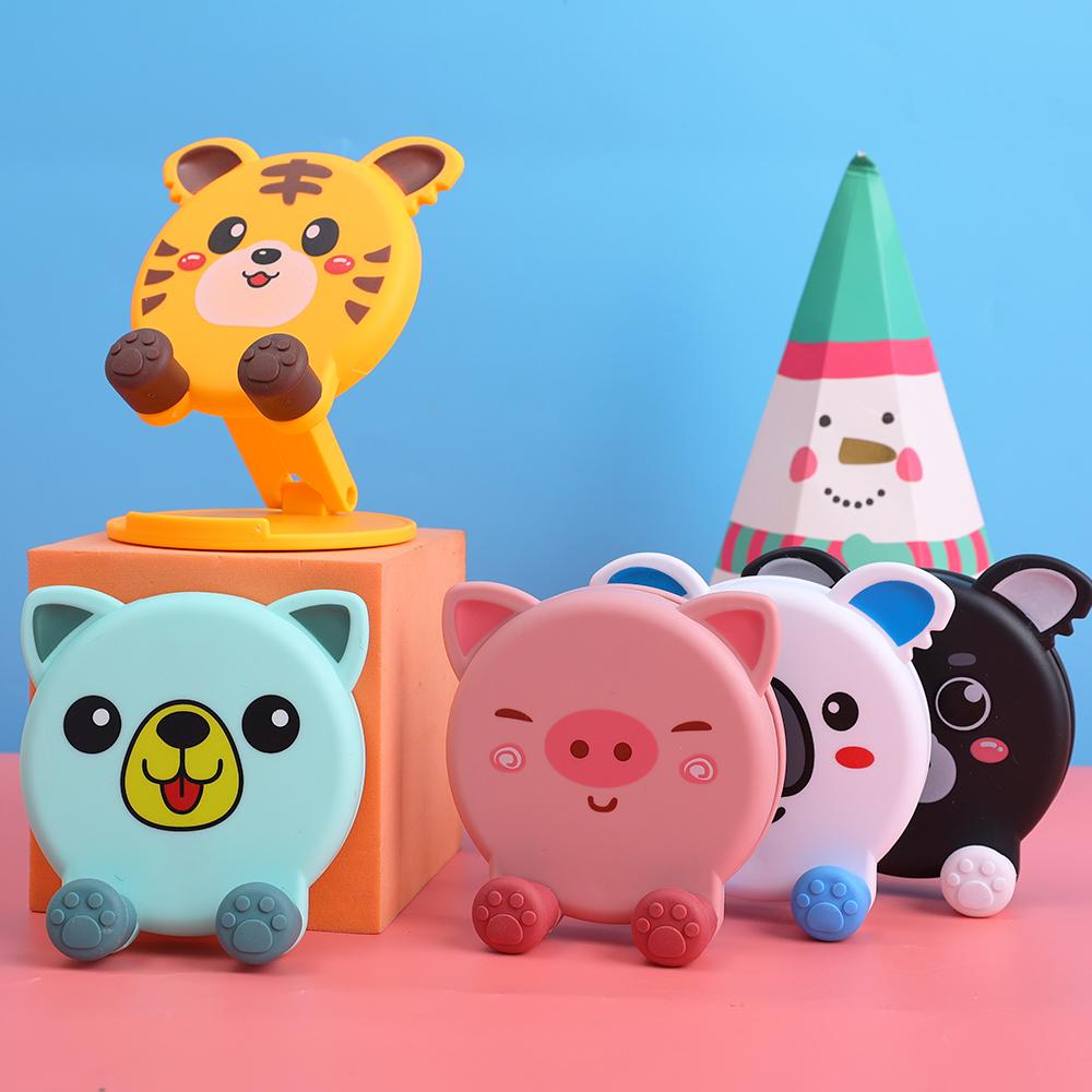 Niedlicher Cartoon-Halter, faltbarer Handy-Ständer, Tablet-Unterstützung, Desktop-Hebehalterung für Mobiltelefone für iPad iPhone