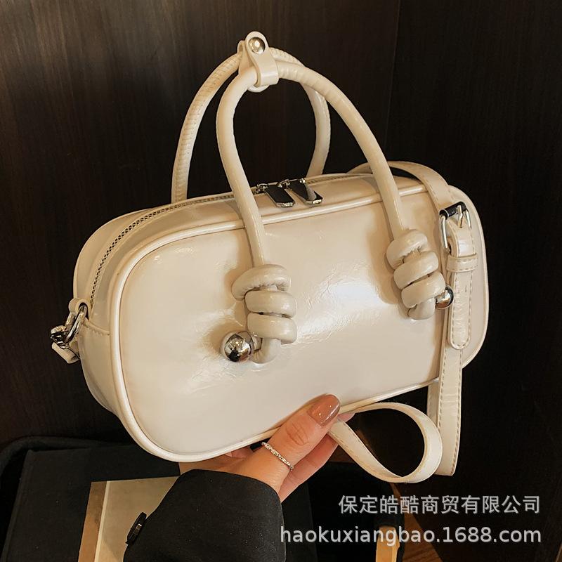 High sense Boston bag women's fashion niche design 2025 new spring and summer messenger bag portable bowling bag
