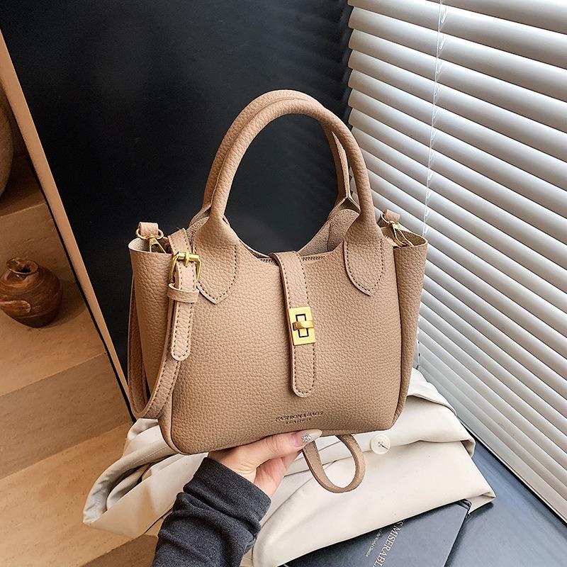 Simple hand bucket bag, new fashionable versatile shoulder bag, high-end trendy messenger bag
