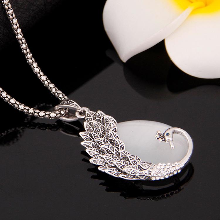 

Высококлассное ретро колье «кошачий глаз»: Универсальная цепочка-кулон с павлином для женщин