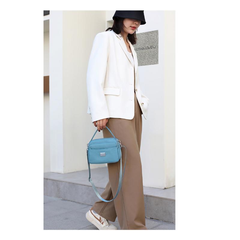 Bolsa feminina de tendência de rua portátil de um ombro crossbody bolsa de mãe feminina da moda