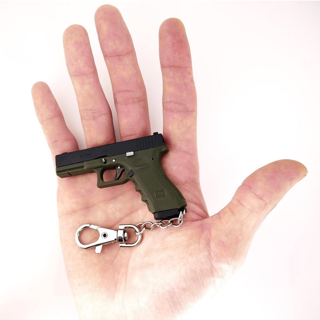 [Azalea Co., Ltd.] HITCALL Glock 17 Super Precision 1/3 Typ výfuku Zliatinová kľúčenka Kovový záver Mini model zbrane Špeciálne puzdro na zbraň (kaki)