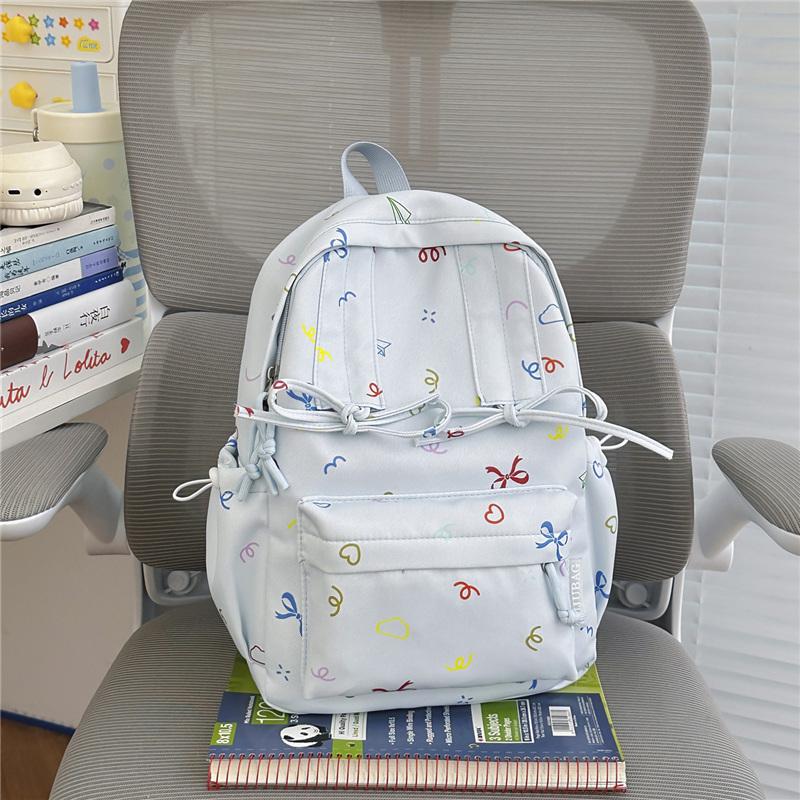 Cute Bow Tie Print School Backpack Lightweight Nylon Zipper Daypack with Front Pocket for Teen Girls Daily Travel
