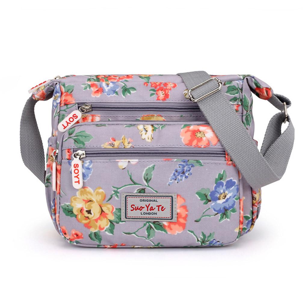floral messenger bolsa