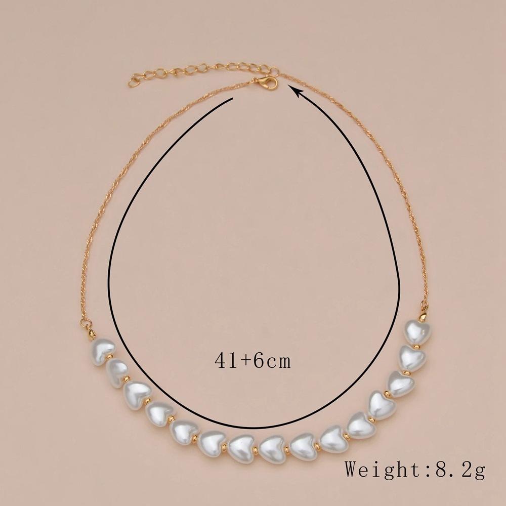 Elegant temperament peach heart imitation pearl necklace short necklace accessories spot