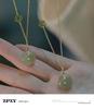 Hetian Jade Necklace: 2025 Women's Jade Pendant Choker with Peace Buckle Clavicle Chain In New Chinese Style