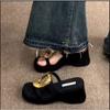 Black thick-bottomed cool slippers women's summer new niche fashion simple metal one-word beach slippers