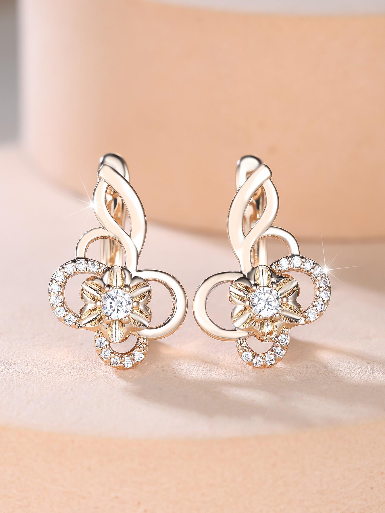 Micro-set diamond rotating windmill stud earrings, temperament niche design sense banquet women s earrings