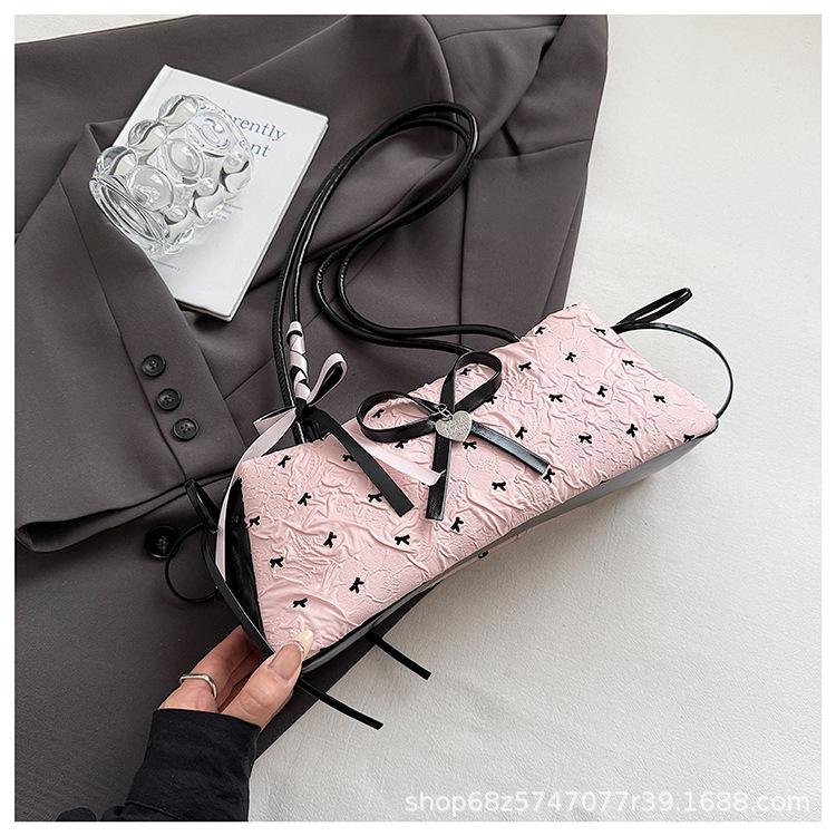 

Sweet foreign style bow underarm bag women s 2025 new French niche baguette bag versatile shoulder commuter bag