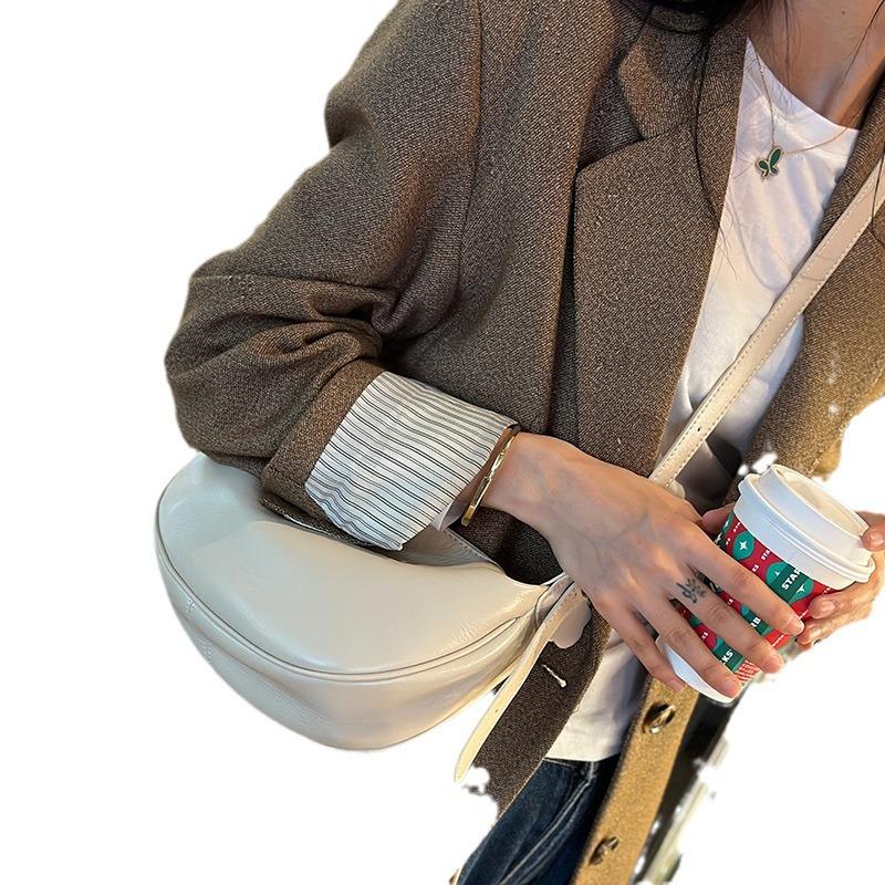 Real Leather Women's Bag New Fashionable Armpit Dumpling Bag Retro Commuting Cowhide Shoulder Crossbody Bag Women's Saddle Bag