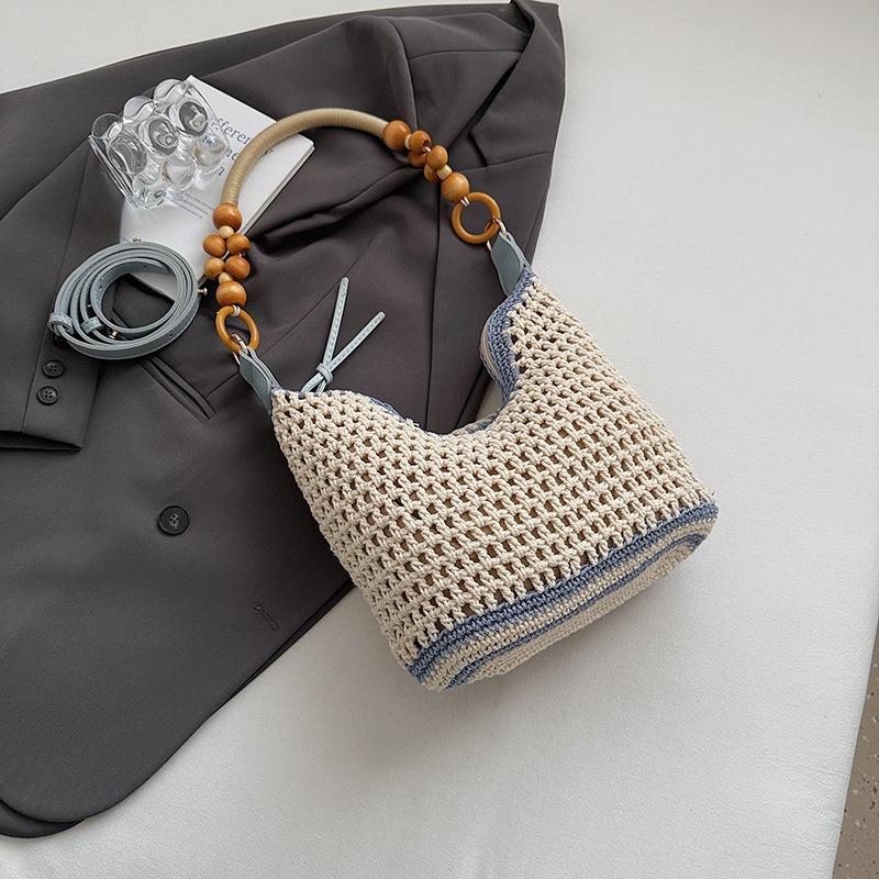 

Плетеная сумка женская осенняя новая модная ажурная вязаная сумка на плечо большой вместимости сумка-ведро для поездок на работу