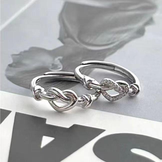 

Entwined Love Zircon Ring: Elegant Design for Couples