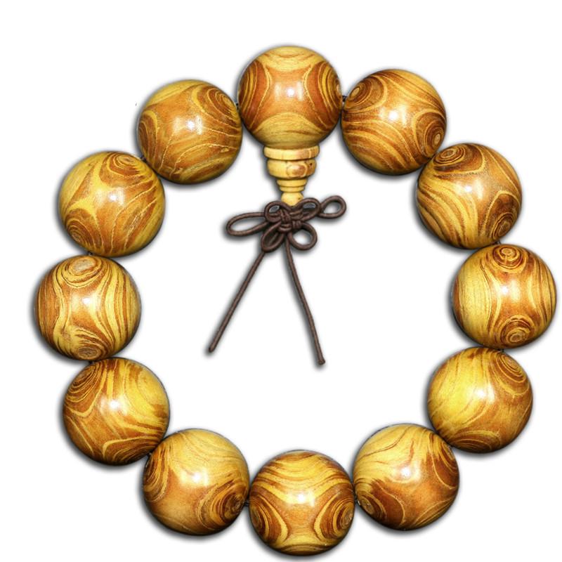 Exquisite Double-Eye Ghost Face Gold Thread Buddhist Bead Bracelet In Premium Wood