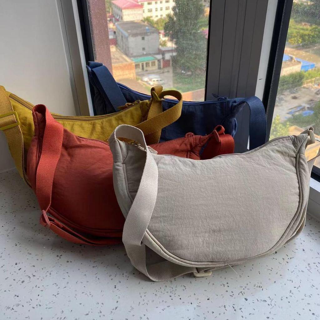 Summer 2025 Women's Waterproof Nylon Crossbody Bag - Solid Color Dumpling Style