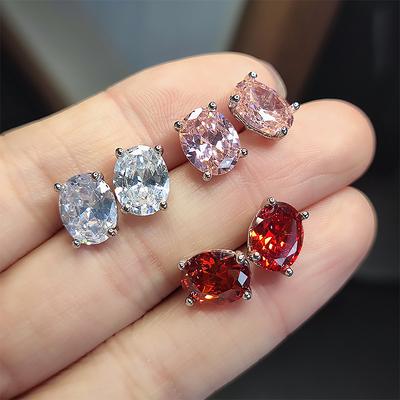 Hoher Blitz Kundenbestellung Oval Super Blitz Steckerohrringe Damen Vier-Krappen Hohlblumenboden Granatrot Rosa Stein Weißer Diamant Party-Ohrringe