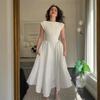 Vestido Midi Adelgazante de Verano 2025 para Mujer Europea y Americana, Cuello Redondo, Sin Mangas