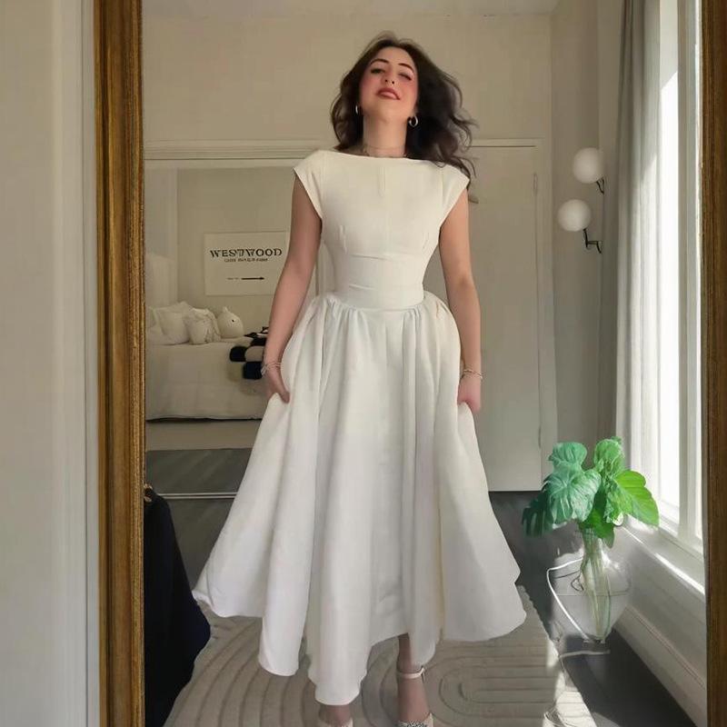 Vestido Midi Adelgazante de Verano 2025 para Mujer Europea y Americana, Cuello Redondo, Sin Mangas