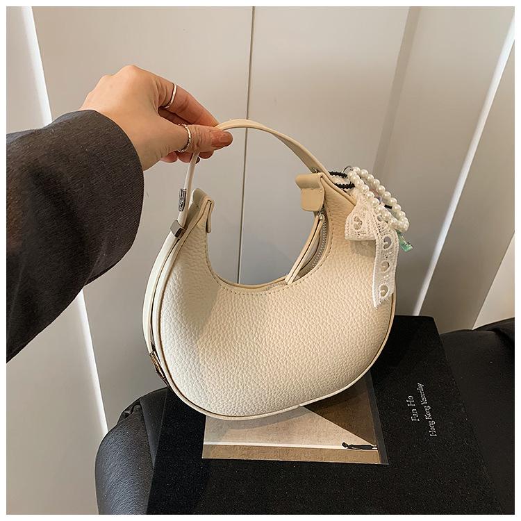 New women's bags, popular shoulder bags, summer personalized portable small round bags, high-end underarm bags, oblique span bags