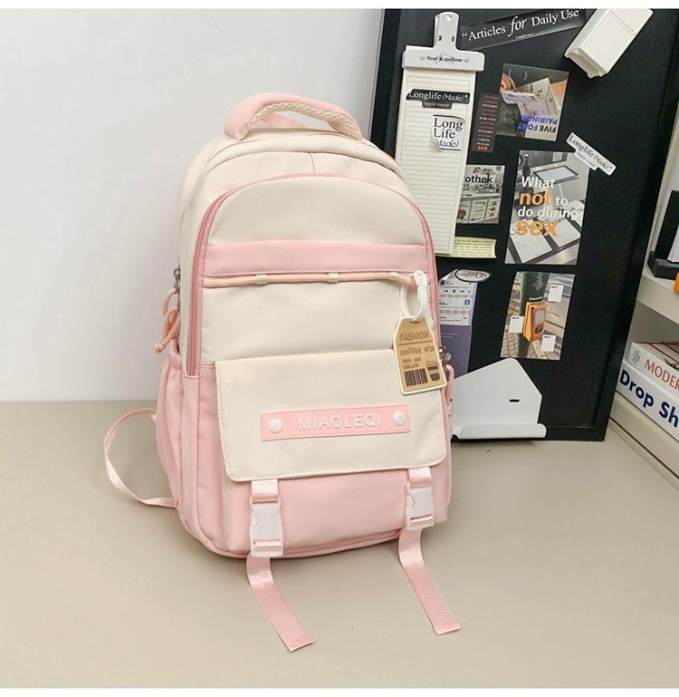 

School bag female high school college student junior high school student simple versatile large capacity backpack рожевий