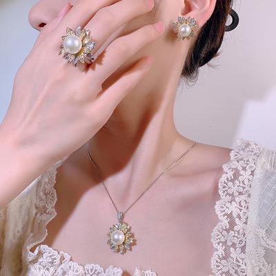 Pearl Set Jewelry Imitation Natural Freshwater Pearl Pendant Ring S925 Silver Needle Pearl Stud Earrings Two-color Electroplating