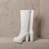 Women's high-heeled boots autumn and winter new waterproof table thick-heeled large-size solid-color medium boots