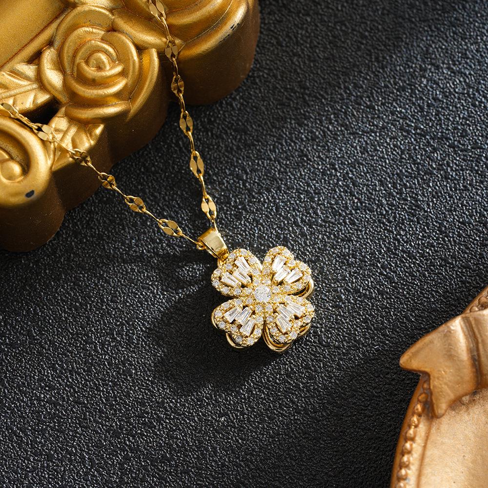 Elegant Hollow Rotating Pendant with Full Zircon, Inspired by Four-Leaf Clover Design - Ladies  Fashion Statement.