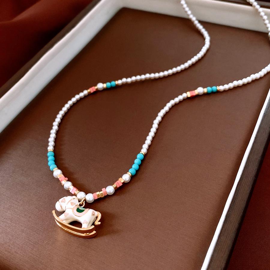 

Vintage Old Money Wind Trojan Horse Turquoise Pearl Necklace Women s High Sense Dopamine Long Neck Chain Accessories Sweater Chain