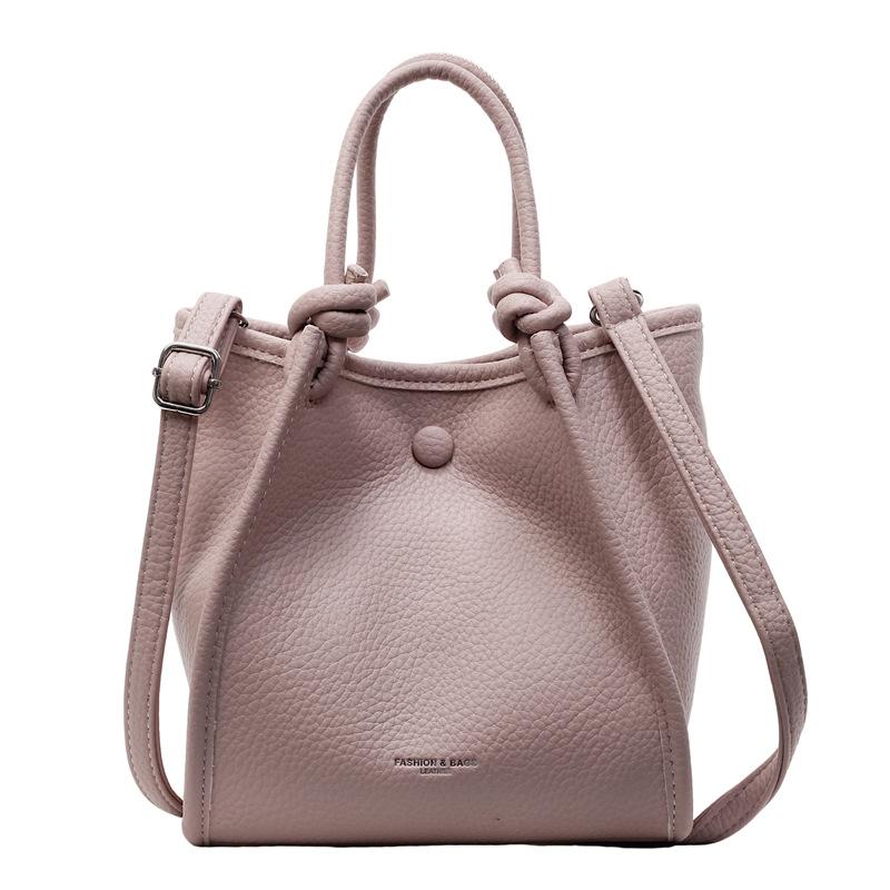 2025 spring and summer new fashion high sense simple solid color bucket bag versatile temperament women's commuter messenger bag