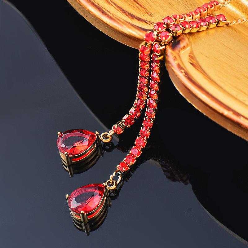 

Длинное колье с вермикулитом из титана и титановой стали в форме капель воды