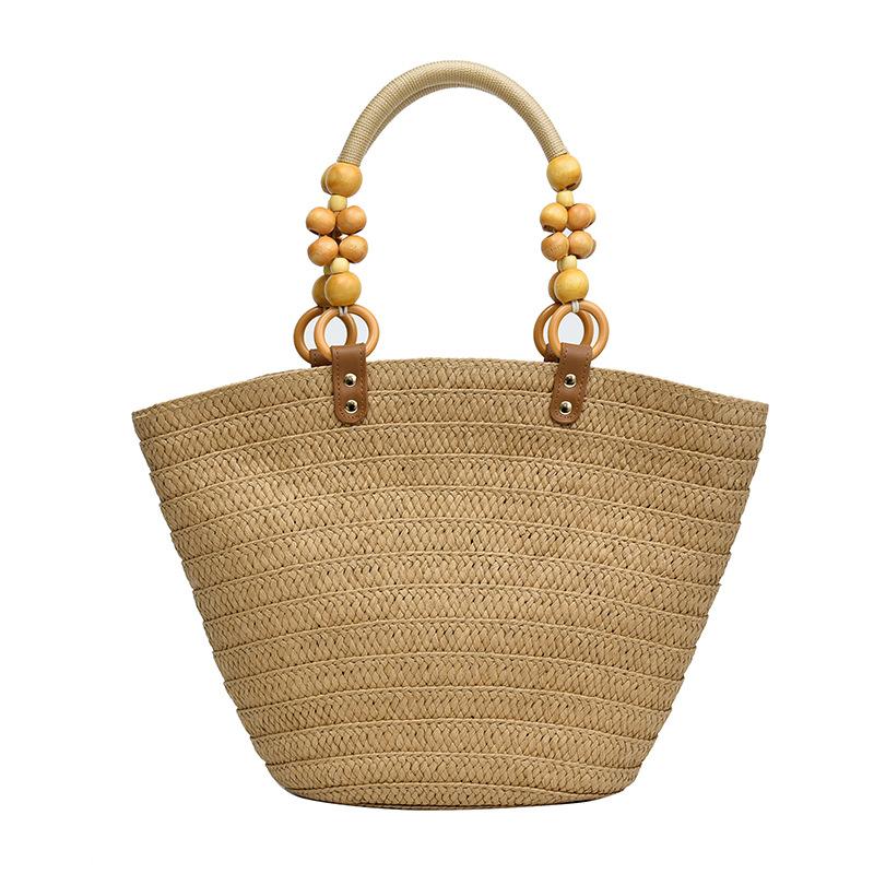 Design sense woven large-capacity handbag women's beach vacation style versatile solid color casual personality shoulder bag