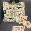 Koreanische Version der Stofftasche für weibliche College-Studenten, niedliche Umhängetasche für den Unterricht, große Kapazität, Tragetasche, Rucksack aus Graffiti-Canvas