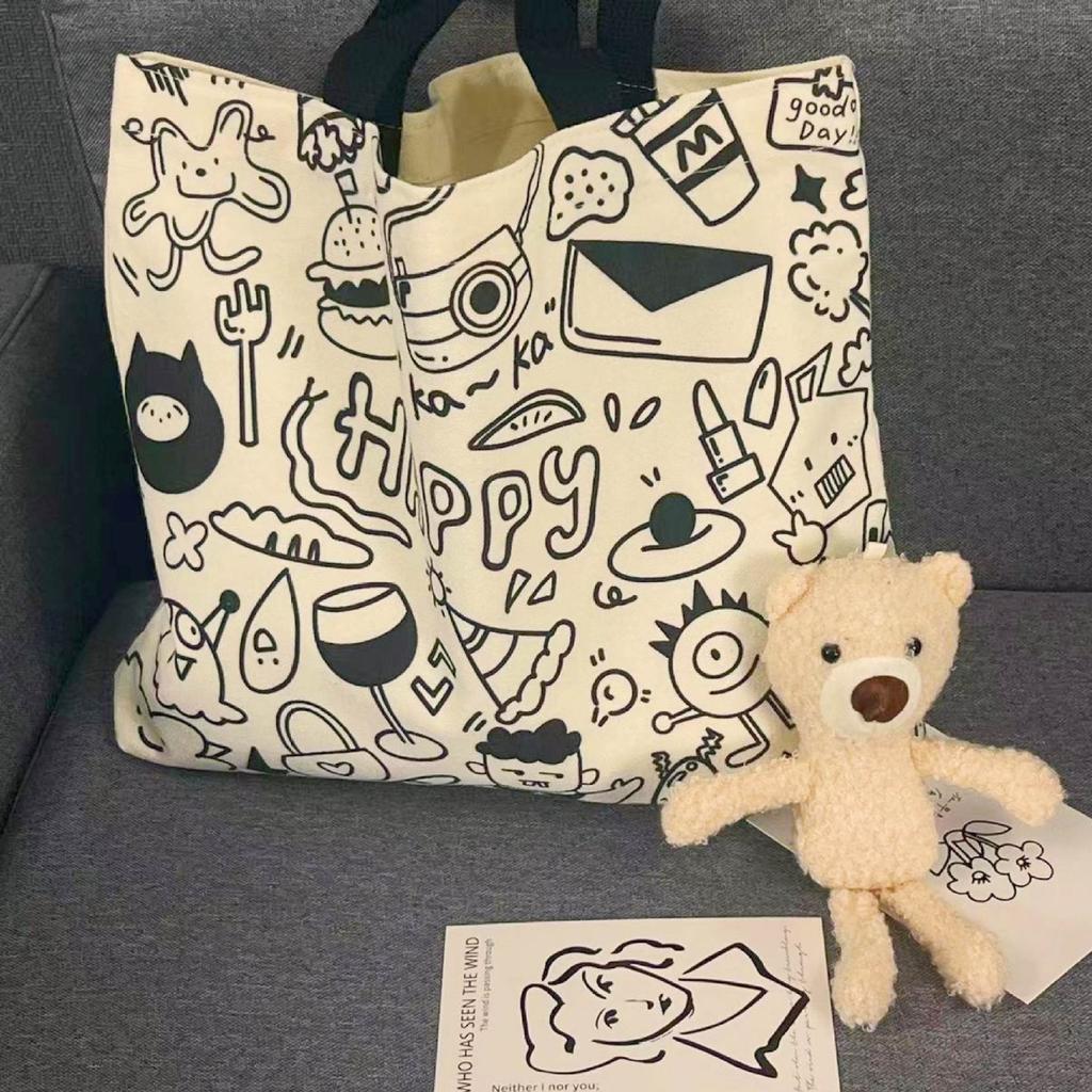 Koreanische Version der Stofftasche für weibliche College-Studenten, niedliche Umhängetasche für den Unterricht, große Kapazität, Tragetasche, Rucksack aus Graffiti-Canvas