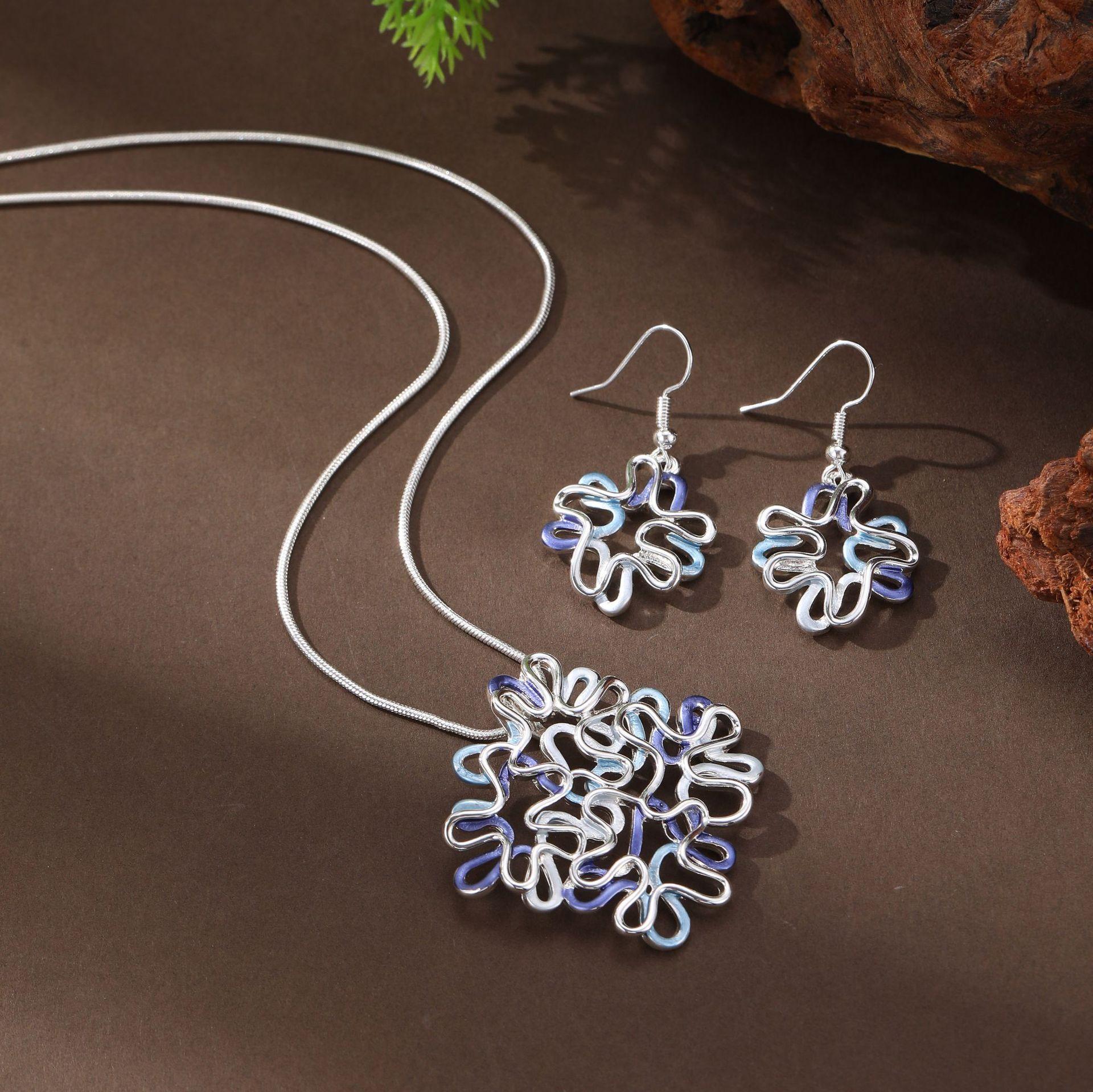 

New enamel geometric line earrings pendant set, women s high-end Chinese knot necklace.