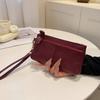Litchi pattern lady holding wallet
