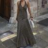European and American new retro polka dot holiday dress, neck deep V big halter pendant big pendulum long dress