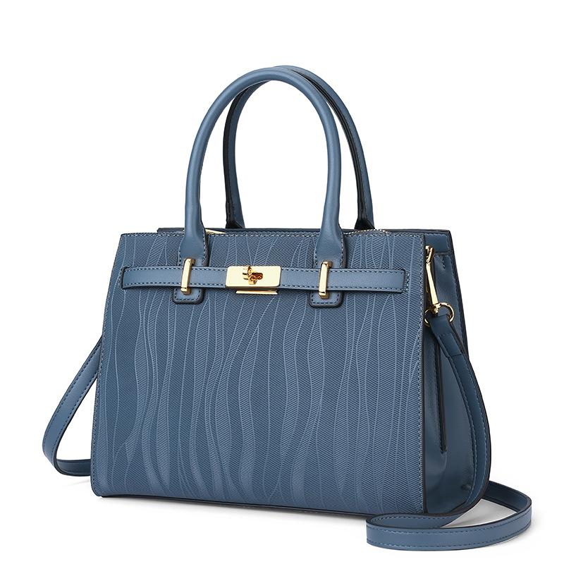 

Red textured wedding bag female 2025 bride model large capacity mother bag mother-in-law middle-aged portable wedding bag mother model синий