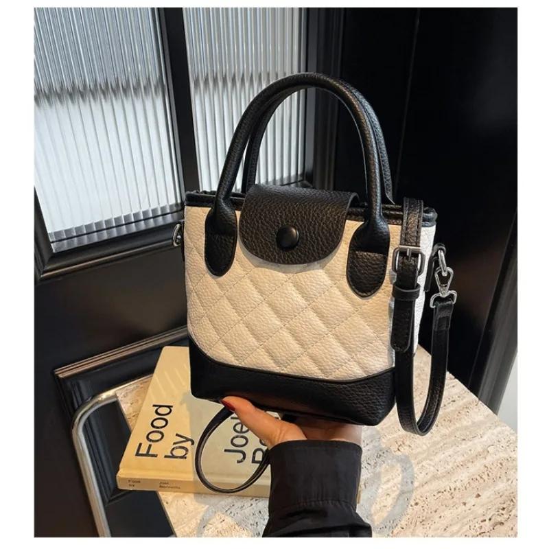 Women's hand-carried travel bag winter new high-end simple trend shoulder Korean versatile explosive bucket bag