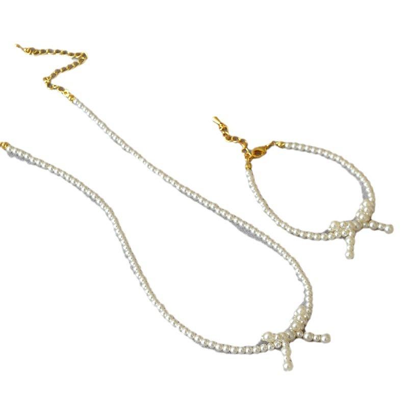 French Niche Elegant and Bright Imitation Shijia Pearl Bow Shape Simple Temperament Short Necklace Choker Woman