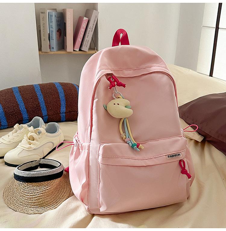 Schoolbag Korean version ins Solid color simple schoolbag Lazy wind backpack Female junior and high school students lightweight large-capacity 
