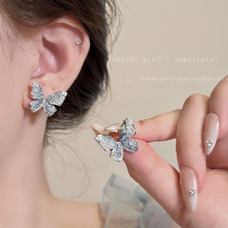 

Accessible Luxury Blue Butterfly Female Best Selling Ice Crystal Elegant Shining Diamond Ice Crystal Butterfly Stud Earrings